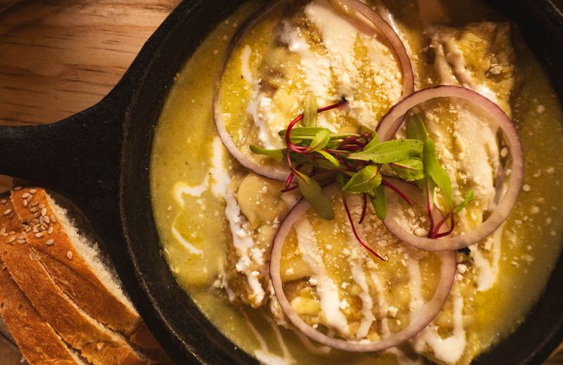 Tomatillo verde enchiladas with cheese and crema