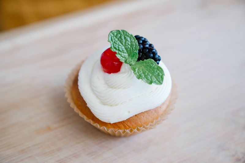 Tres leches cake dessert with whipped cream