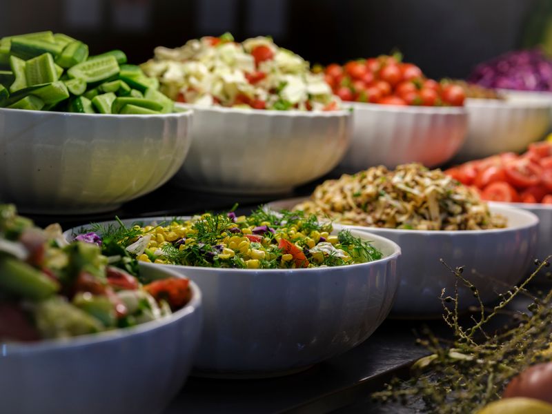 Colorful taco bar setup at a catered event